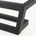 Texture | close view of the matte black steel finish at a corner joint