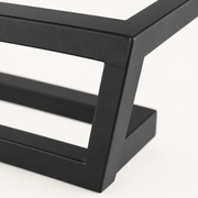 Texture | close view of the matte black steel finish at a corner joint
