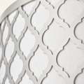 Finish | close view of the brushed nickel lattice and white fabric shade