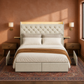 Clay room | Front view in a clay-plaster bedroom with warm light on the beige upholstery