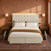 Clay room | Front view in a clay-plaster bedroom with warm light on the beige upholstery