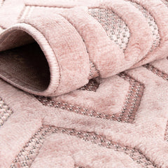 Indoor and Outdoor Area Rug in Pink with Textured Geometric Pattern