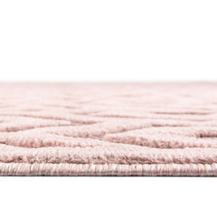 Indoor and Outdoor Area Rug in Pink with Textured Geometric Pattern