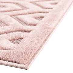 Indoor and Outdoor Area Rug in Pink with Textured Geometric Pattern