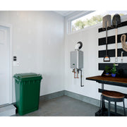 Installed | Tankless water heater shown in an indoor utility-room installation setting