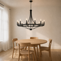 In a room | aged-zinc 12-light wagon-wheel chandelier hanging over a round oak table