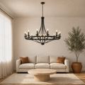 Living room | the wagon-wheel chandelier over a coffee table