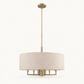 Front | studio front of the beige linen-blend drum and brass rod