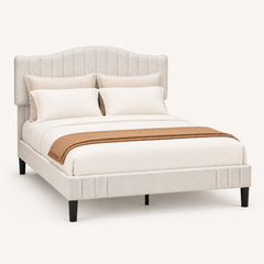 Studio angle | Three-quarter studio view of the bed frame, its textured upholstery, curved headboard, and dark tapered legs