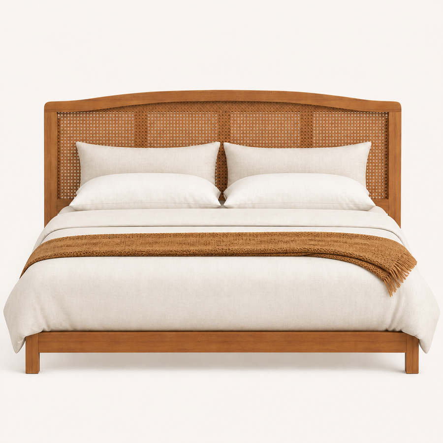 Front | Straight-on studio plate of the whole headboard on a pale backdrop, showing the arched top and cane weave