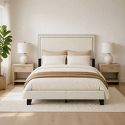 Airy room | Straight-on bed in a bright room with oak nightstands, plant, and rug