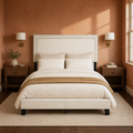 Clay room | Straight-on bed in a clay-toned room with brass sconces and dark nightstands