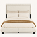 Headboard | Close view of the cushioned headboard and double rows of nailhead trim