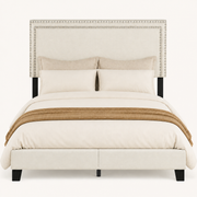 Headboard | Close view of the cushioned headboard and double rows of nailhead trim