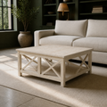 In a room | unfinished square rubberwood coffee table before an ivory sofa in a moss green library