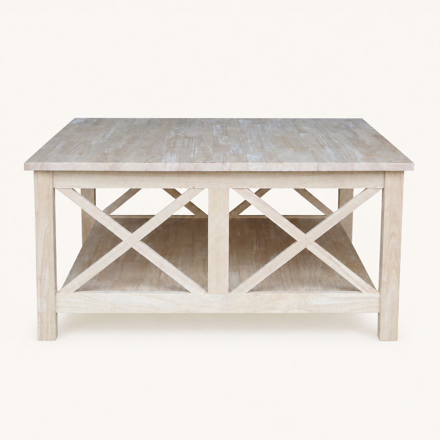 Front | unfinished square rubberwood coffee table with open shelf and crossed braces on a plain studio background