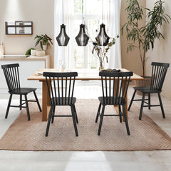 Room | The Kolvern Capofaro Wood Side Chair Set of 4 in a styled room