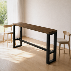 Angle | same dining room, three-quarter so both metal end frames and stretcher read