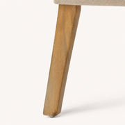 Detail | the tapered wood leg and its floor contact