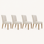 Studio | all four chairs at a true three-quarter studio angle, seat depth and tapered legs both reading