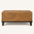 Studio | front view of the square wicker coffee table with black wood legs