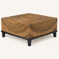 Studio angle | three-quarter studio view of the wicker coffee table and four-leg base