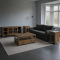 Cool blue-gray living room | four-piece brown wood table set with TV stand, coffee table, and two end tables