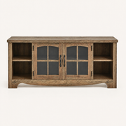 Studio front | brown wood-grain TV stand with arched glass doors, open side shelves, black iron pulls, and curved lower apron