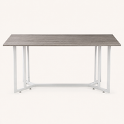 Front | gray-top drop-leaf table centered on paper, both leaves up, white iron trestle
