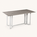 Studio | three-quarter studio view of the top, leaf hinges, and white trestle stretcher