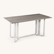 Studio | three-quarter studio view of the top, leaf hinges, and white trestle stretcher