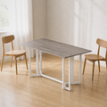 Angle | same dining room, table at a three-quarter so the gate-leg trestle and leaf seams both read