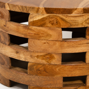 Joinery detail | close view of staggered curved wood slats and open rectangular gaps in the base