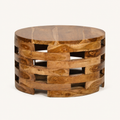 Front | round honey-brown wood coffee table with staggered open slat base on a clean studio background