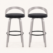 Front | both stools centered on a plain background, full height from footrest ring to back rail