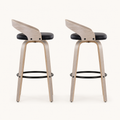 Side | both stools in profile, showing the footrest ring and back-rail curve