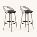 Angle | both stools from a three-quarter turn, showing the curved back rail and leg splay