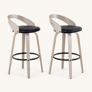 Angle | both stools from a three-quarter turn, showing the curved back rail and leg splay