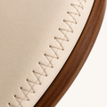 Closer | beige faux leather grain and the seat edge topstitch