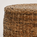 Construction close-up | coiled woven top edge meeting the horizontal rattan body weave