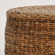 Construction close-up | coiled woven top edge meeting the horizontal rattan body weave