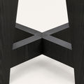 Detail | the flat-strap X-brace knuckle where the trestle legs meet
