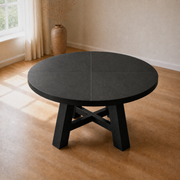 In a room | a second angle on the table in the flax dining room, the full round top and trestle base visible