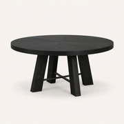 Studio | table at a true three-quarter studio angle, the four-panel top and splayed trestle legs both reading
