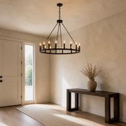 Entry | the same chandelier hanging above an entryway console table
