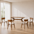 Scale | table and four chairs against a full-height window showing true room scale