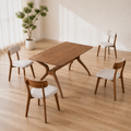Complete set | all five pieces, the trestle table and four chairs, arranged as sold