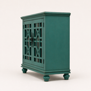 Side studio | teal-green cabinet showing the broad solid right panel, door depth, molded top and turned bun feet