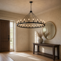 Entryway | the wagon-wheel chandelier hanging over an entry console