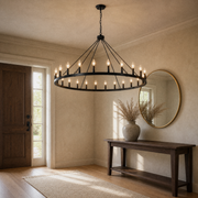 Entryway | the wagon-wheel chandelier hanging over an entry console